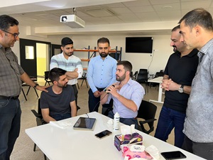 people talking at a table